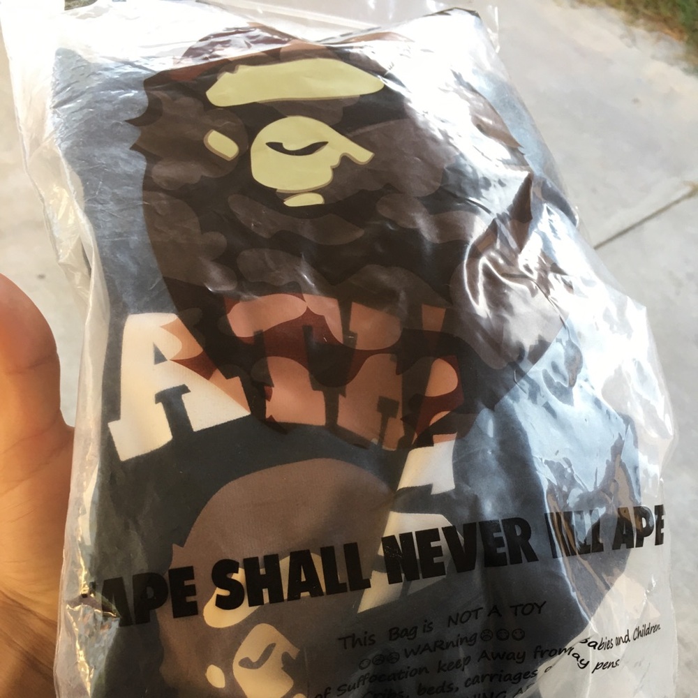 Bape College T-Shirt Black in a size Medium.  Going for $75